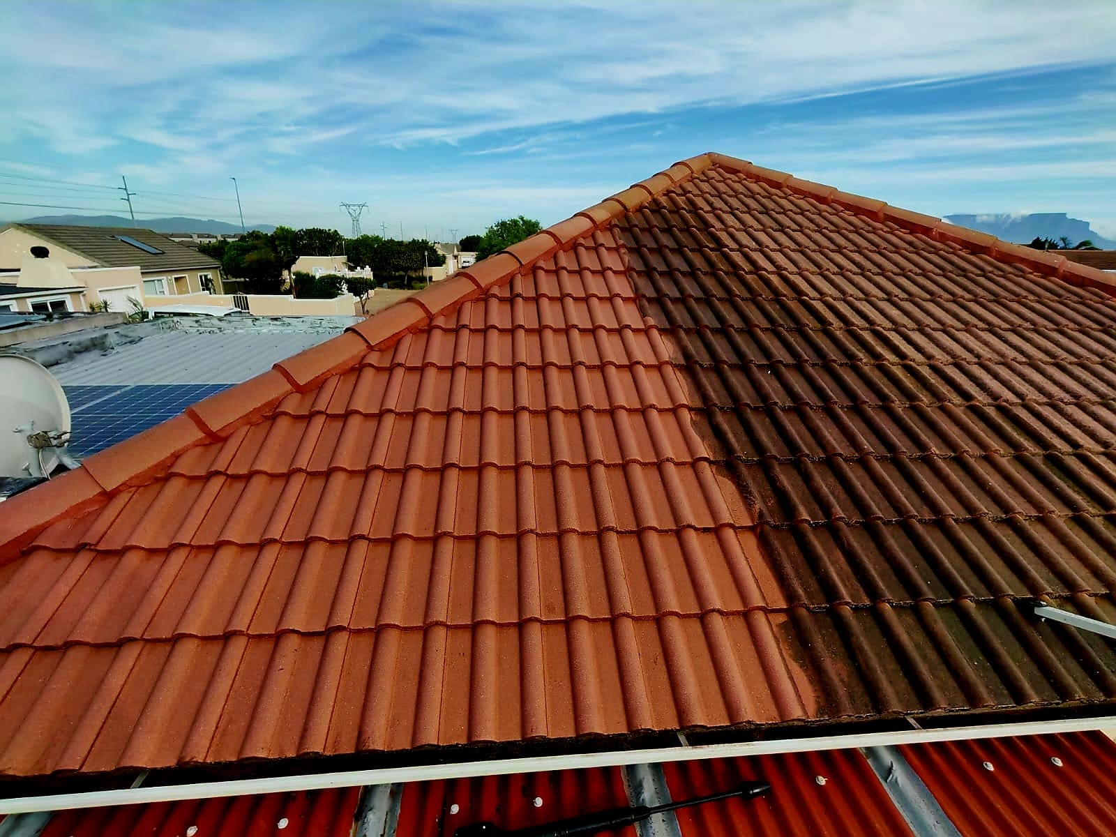 A genuine Sunflow tiled-roof clean in progress at a Cape Town property